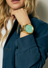 Load image into Gallery viewer, Nixon Corporal SS Gold / Turquoise / Gold New Style
